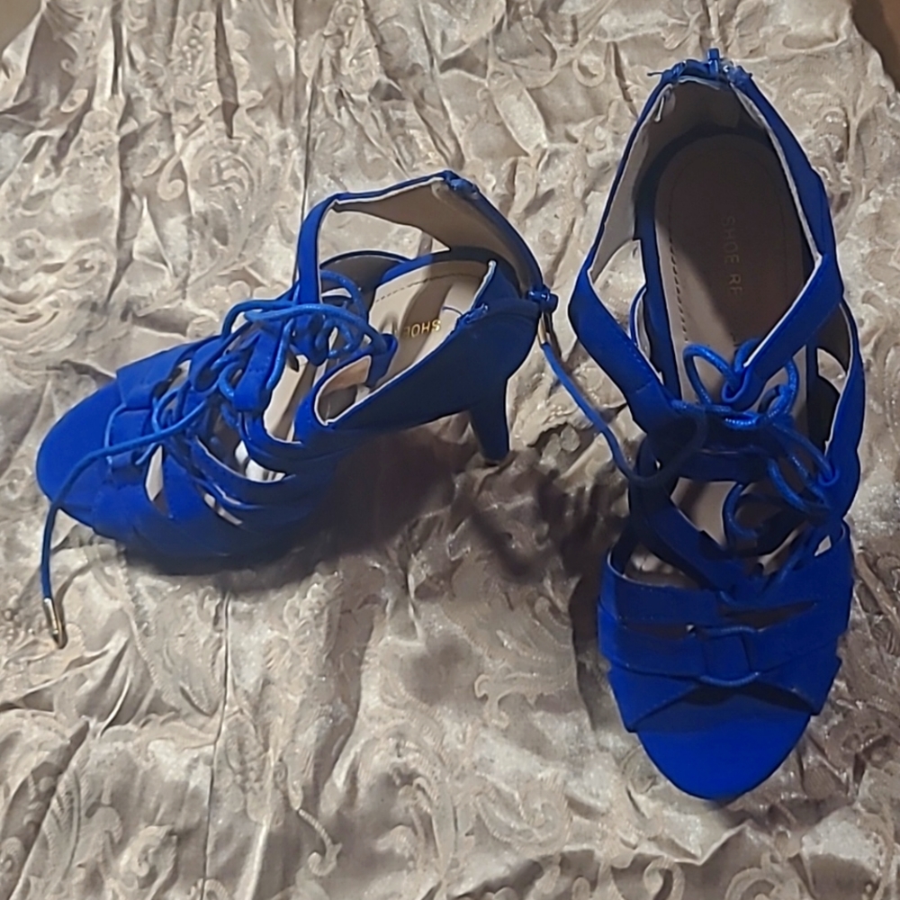 Never worn blue strappy heels